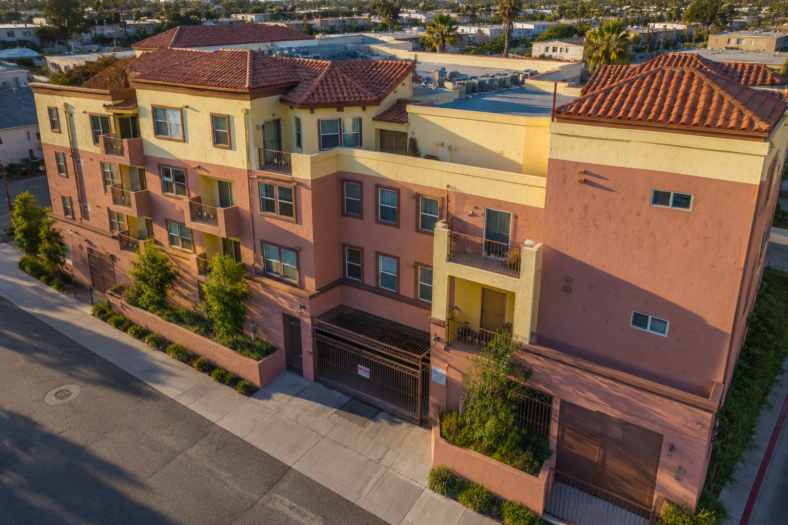 Archwood Court apartment building exterior at golden hour